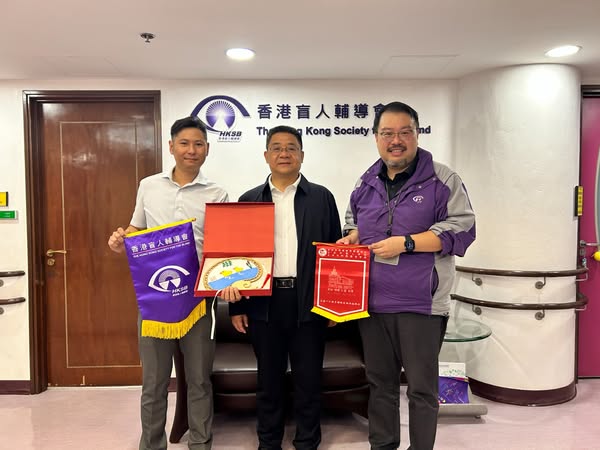Representative from Beijing School for the Blind visited our headquarter