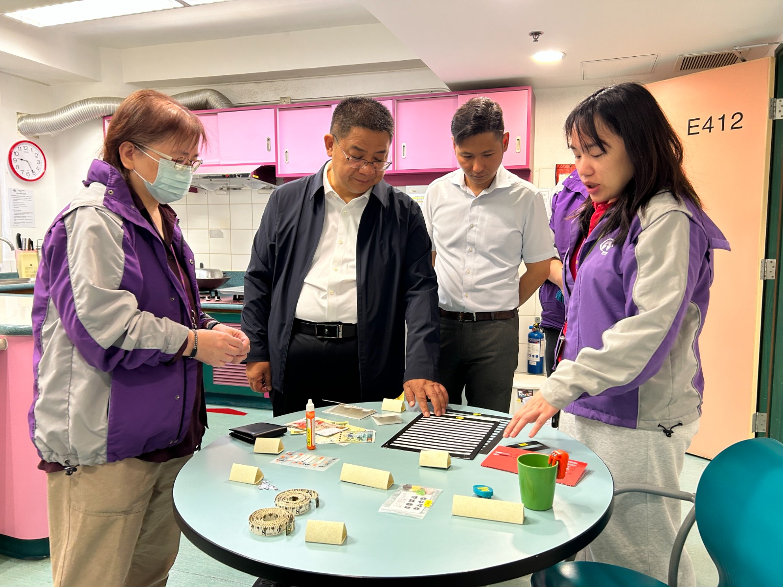 Representative from Beijing School for the Blind visited our headquarter